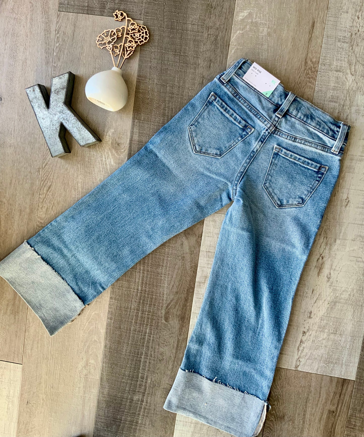 Mid Rise Wide Flare Jeans by KanCan