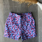 Red, White, & Bloom Swim Trunks