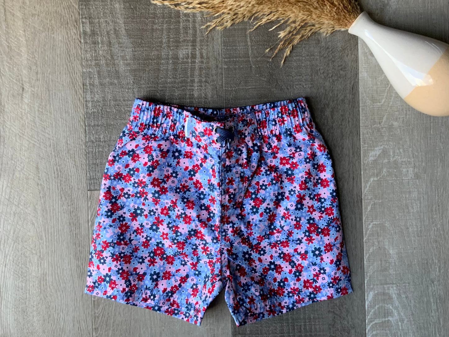 Red, White, & Bloom Swim Trunks