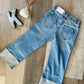 Mid Rise Wide Flare Jeans by KanCan